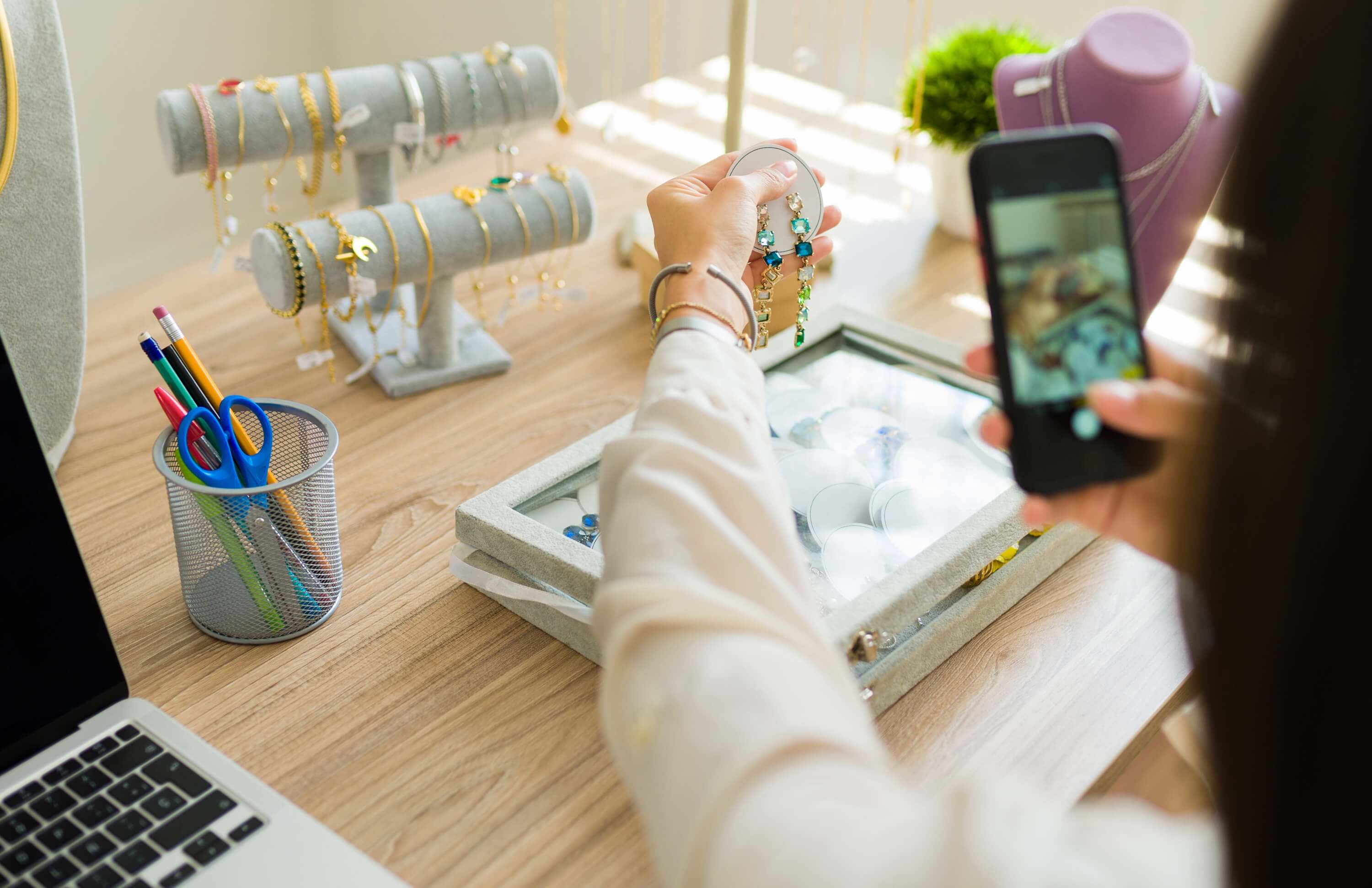 Photographing jewelry products for an e-commerce store setup, emphasizing high-performance online retail.